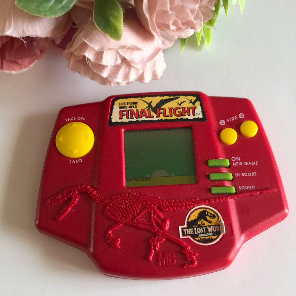Jurassic Park The Lost World Electronic Hand Held Game 1996 Milton Bradley VTG